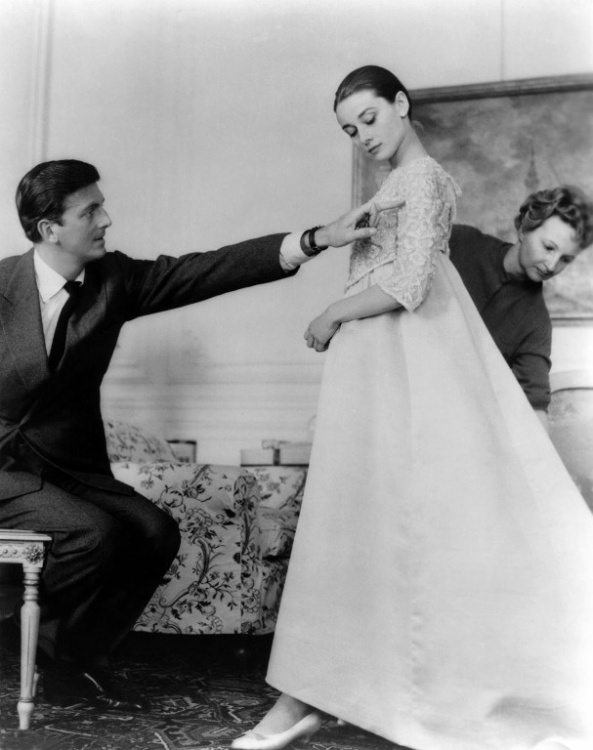 Hubert de Givenchy in the 50's, costume designer, with Audrey Hepburn (Credit: AFP Photo)